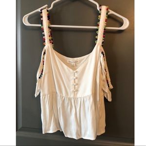 Honey punch pompom-trim cold shoulder top